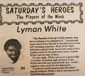 Newspaper article about Lyman White